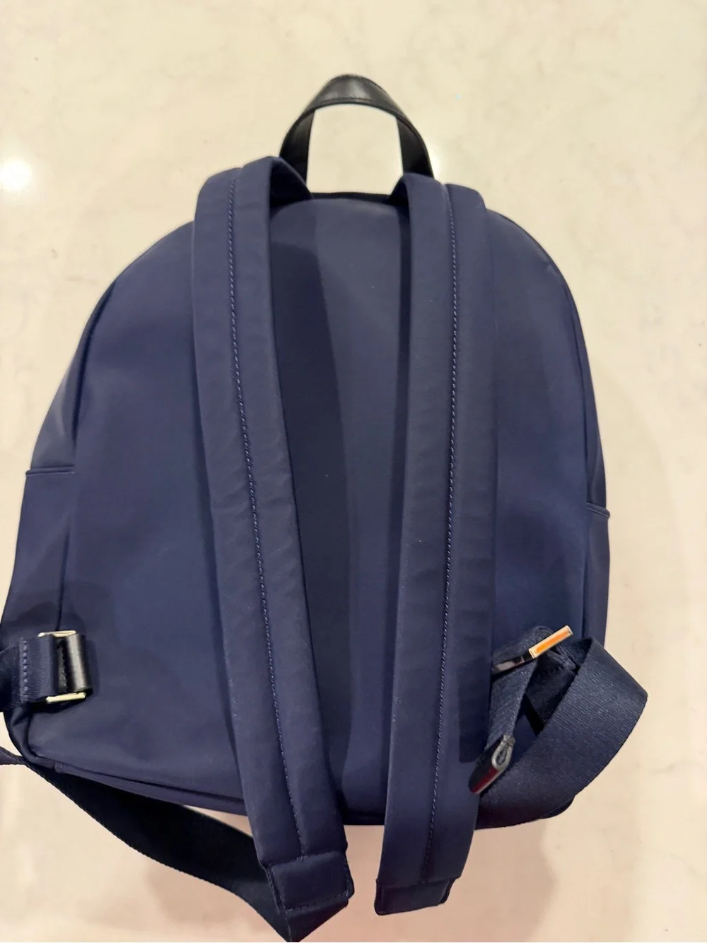 kate spade navy blue nylon backpack with gold hardware